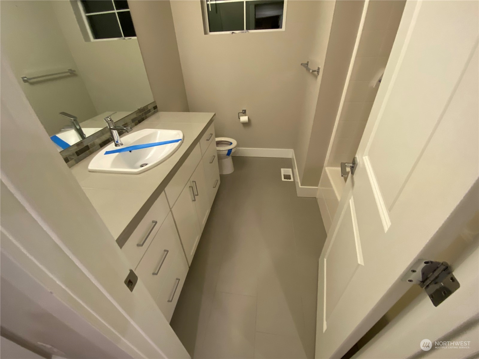 19721 Meridian Place West Bothell, WA 98012 - Photo 14 of 24 a bathroom with a granite countertop sink toilet and shower