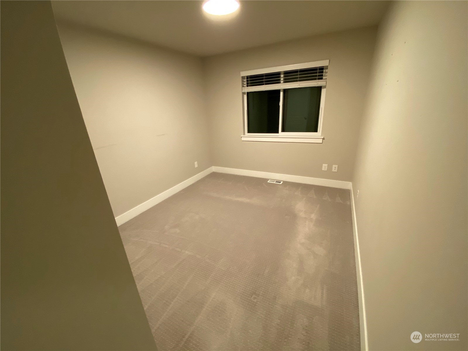 19721 Meridian Place West Bothell, WA 98012 - Photo 20 of 24 an empty room with a window