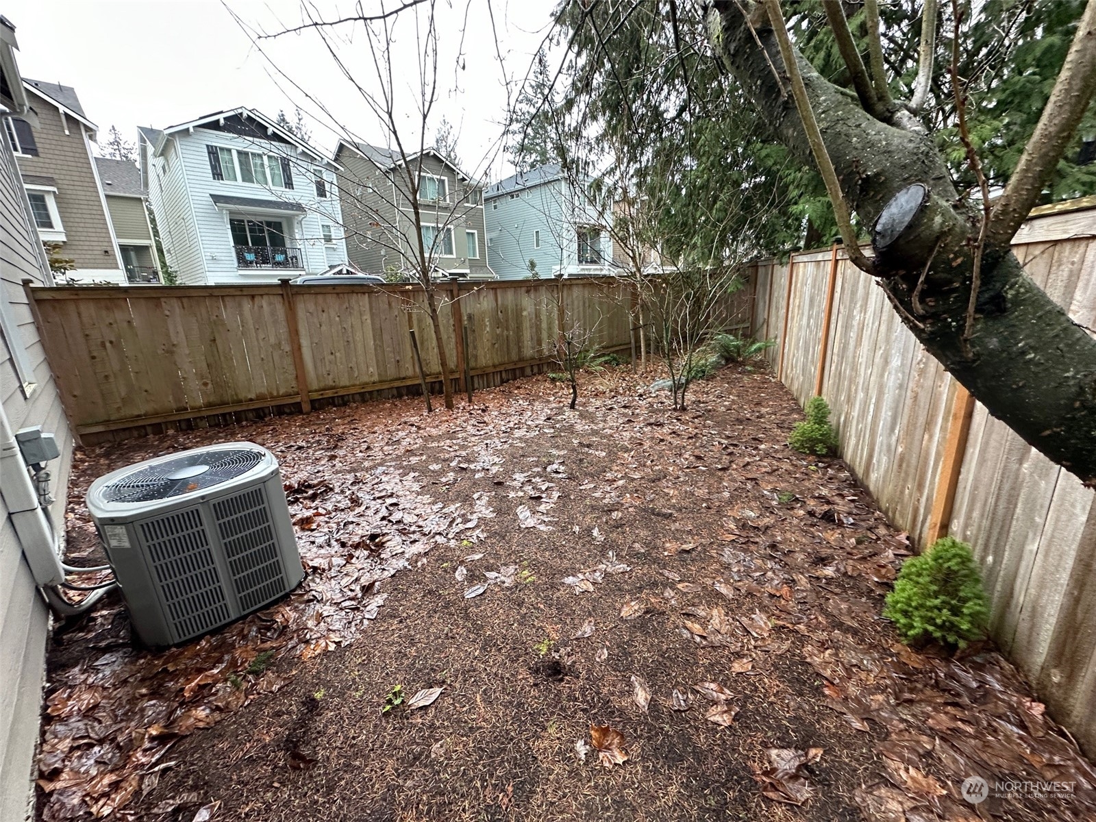 19721 Meridian Place West Bothell, WA 98012 - Photo 23 of 24 a backyard of a house with table and chairs