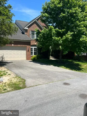 front view of a house with a street