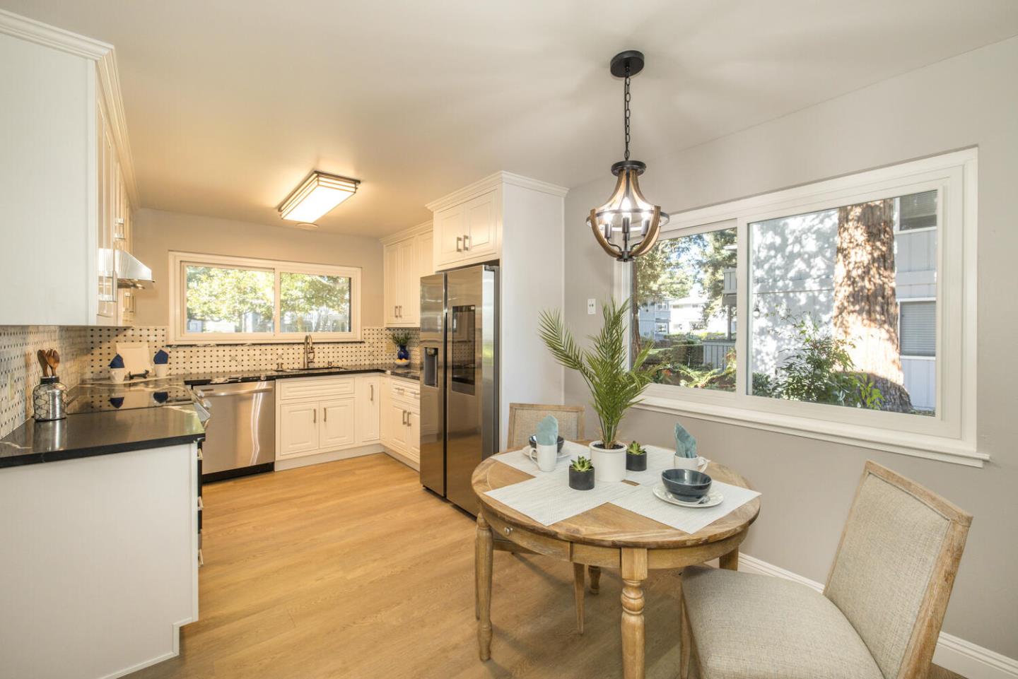 4027 Rector Common Fremont, CA 94538 - Photo 13 of 40 a kitchen with sink refrigerator and window