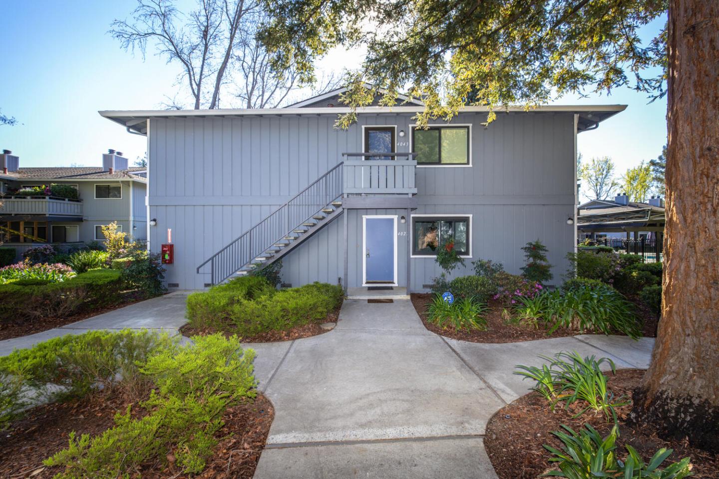 4027 Rector Common Fremont, CA 94538 - Photo 2 of 40 a front view of a house with garden