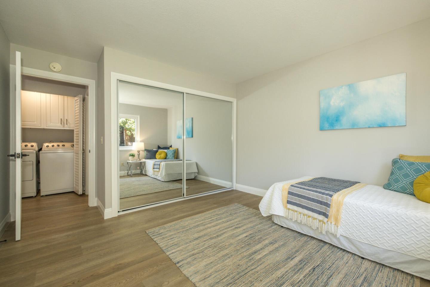 4027 Rector Common Fremont, CA 94538 - Photo 21 of 40 a bedroom with a bed and view of living room