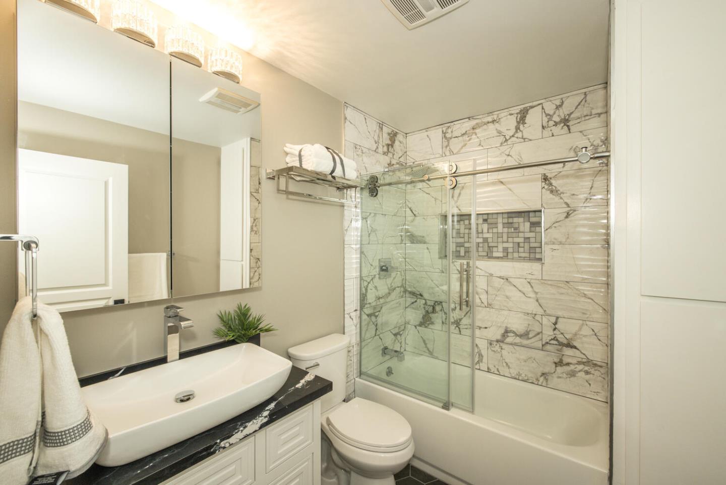 4027 Rector Common Fremont, CA 94538 - Photo 22 of 40 a bathroom with a sink a toilet and shower