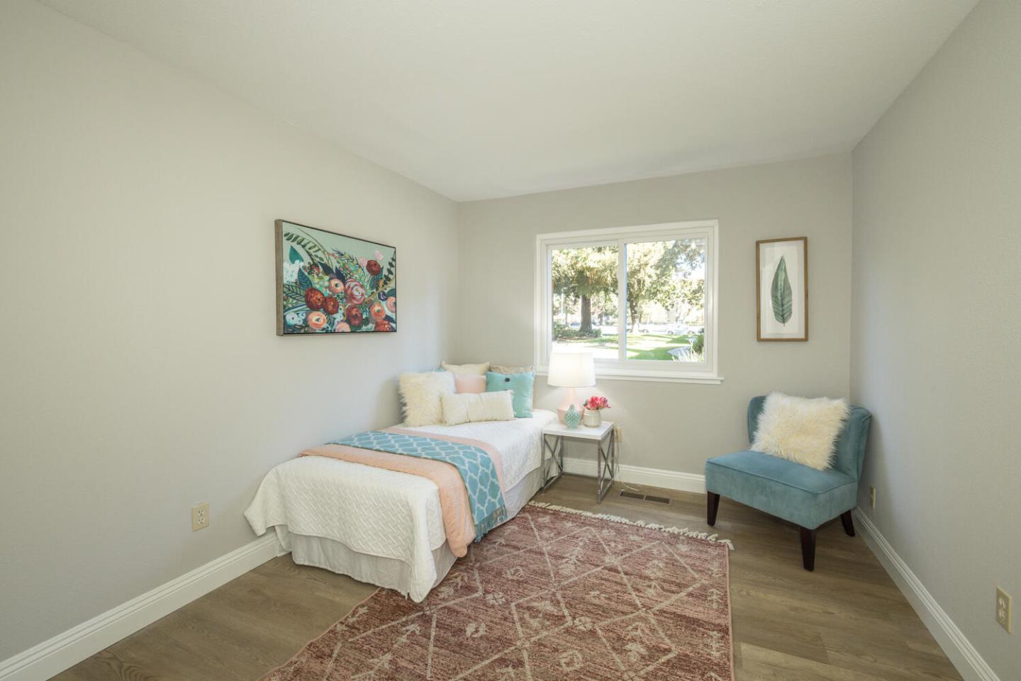 4027 Rector Common Fremont, CA 94538 - Photo 24 of 40 a bedroom with a bed and a couch
