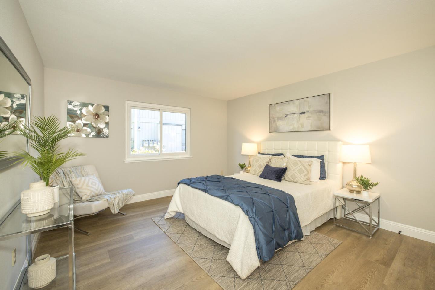 4027 Rector Common Fremont, CA 94538 - Photo 27 of 40 a bedroom with a bed and a window