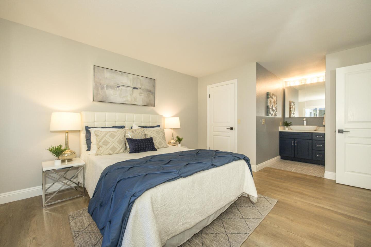 4027 Rector Common Fremont, CA 94538 - Photo 28 of 40 a bedroom with a bed and a table in it