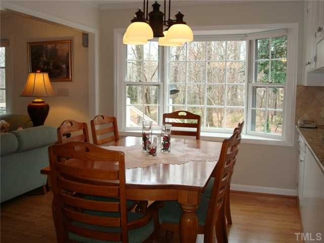7905 Hollander Place Raleigh, NC 27606 - Photo 19 of 25 Sunnny breakfast room has bay window