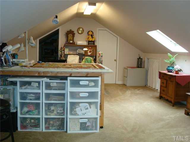 7905 Hollander Place Raleigh, NC 27606 - Photo 23 of 25 Second floor bonus/craft room has been nicely finished but is NOT included in heated sq. footage.