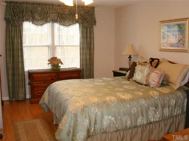 7905 Hollander Place Raleigh, NC 27606 - Photo 9 of 25 Pretty master suite has dressing room and updated bath