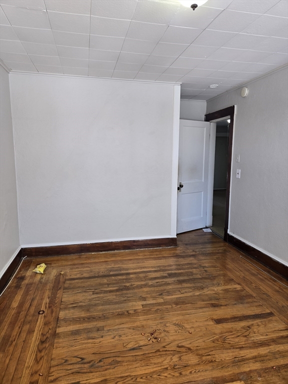 263 Elm Street, Unit 3L Holyoke, MA 01040 - Photo 4 of 12 a view of an empty room and wooden floor