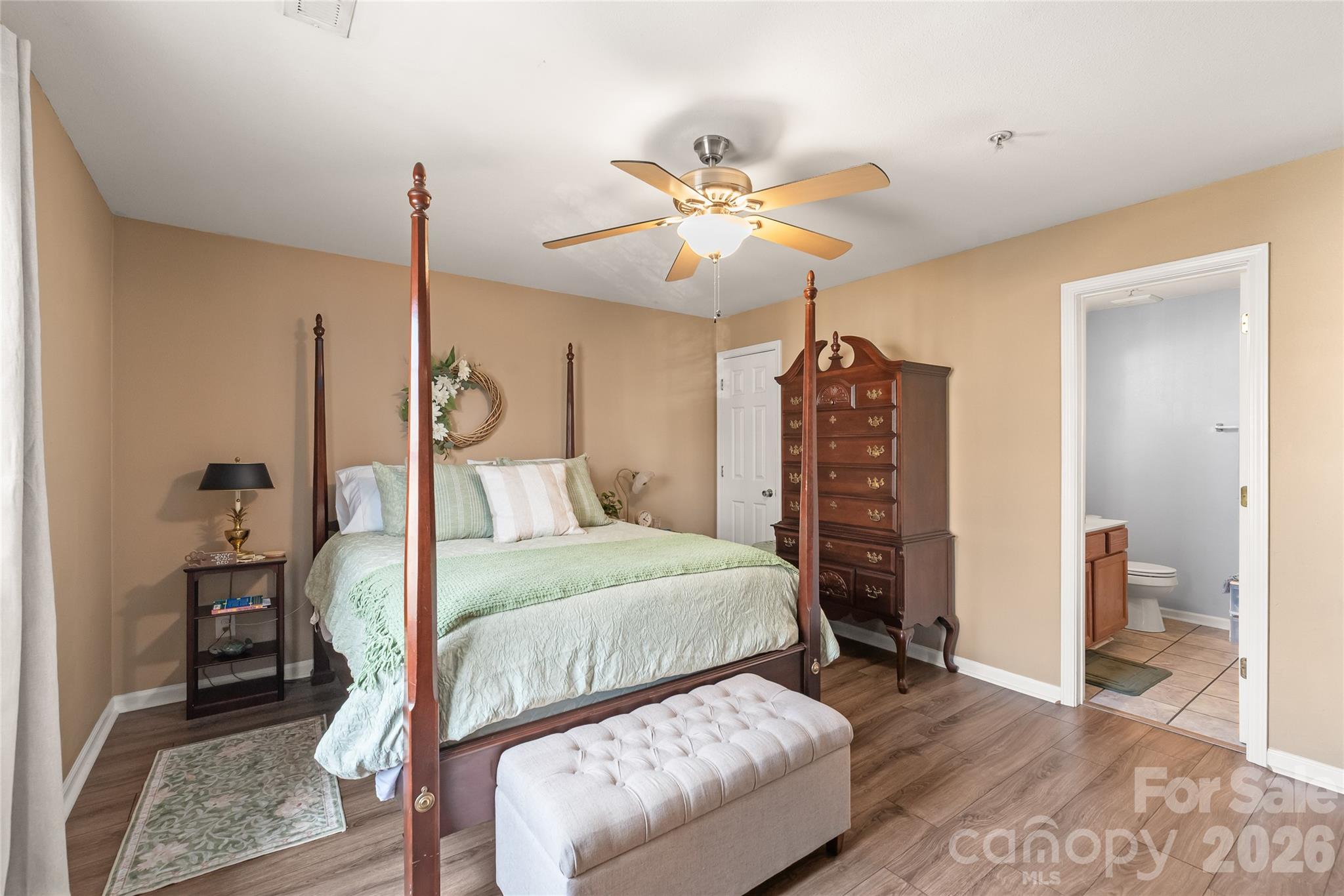 3983 Town Center Road Harrisburg, NC 28075 - Photo 8 of 13 a bedroom with a bed and dresser