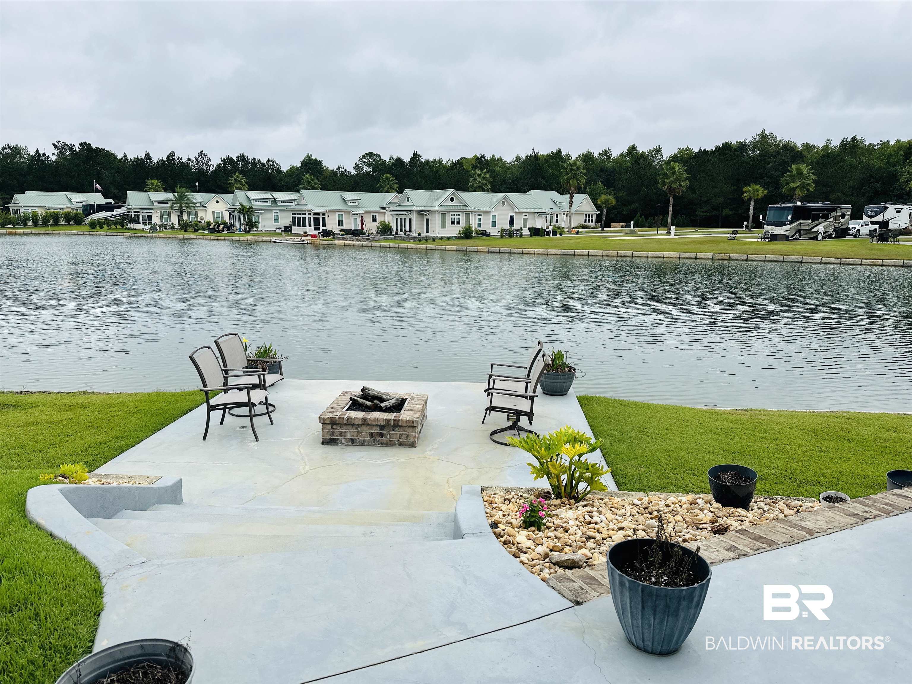 11996 Raptor Court Elberta, AL 36530 - Photo 5 of 45 Water view featuring nearby suburban area and a fire pit