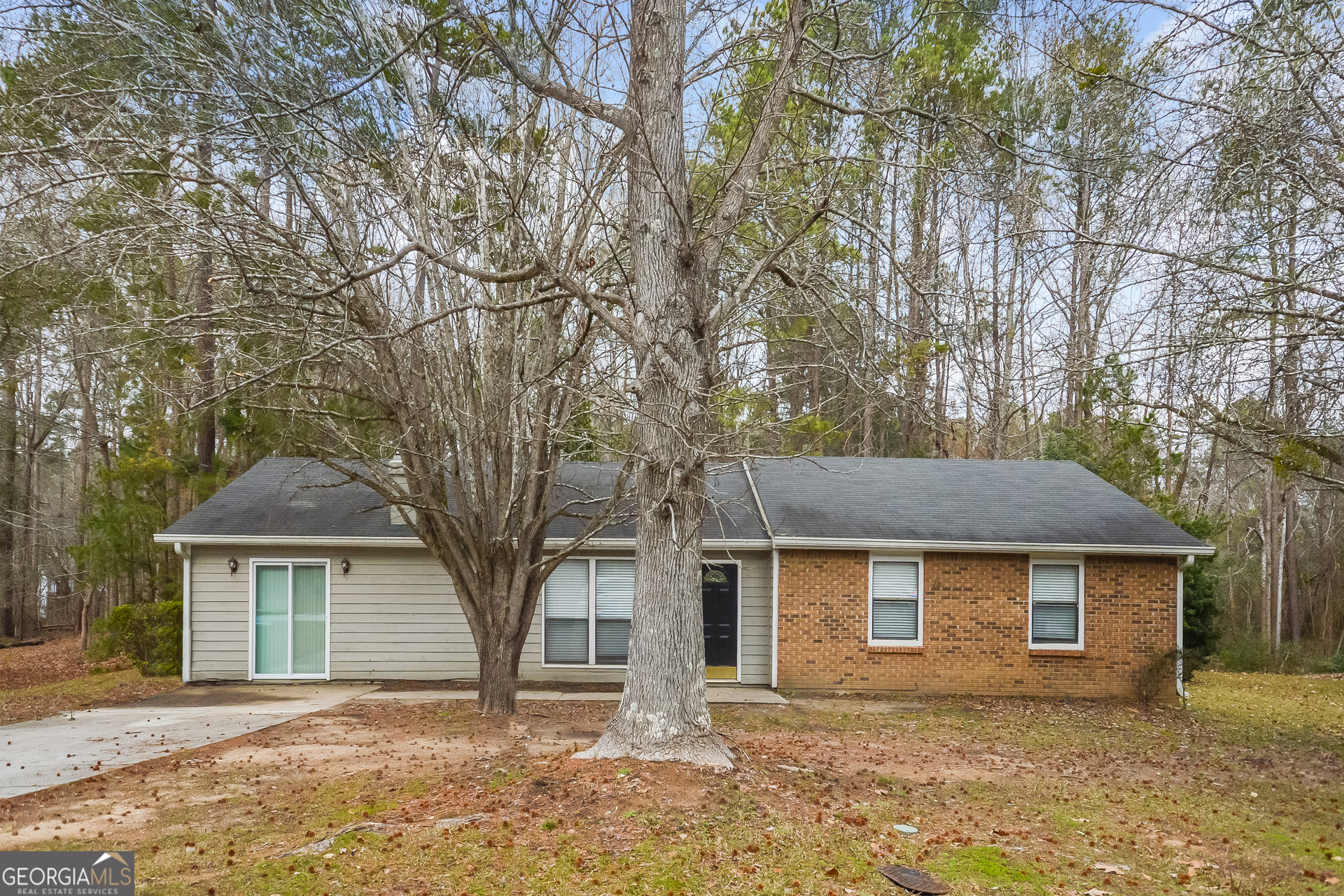 5348 Cedar Rock Drive Lithonia, GA 30038 - Photo 1 of 1 front view of a house