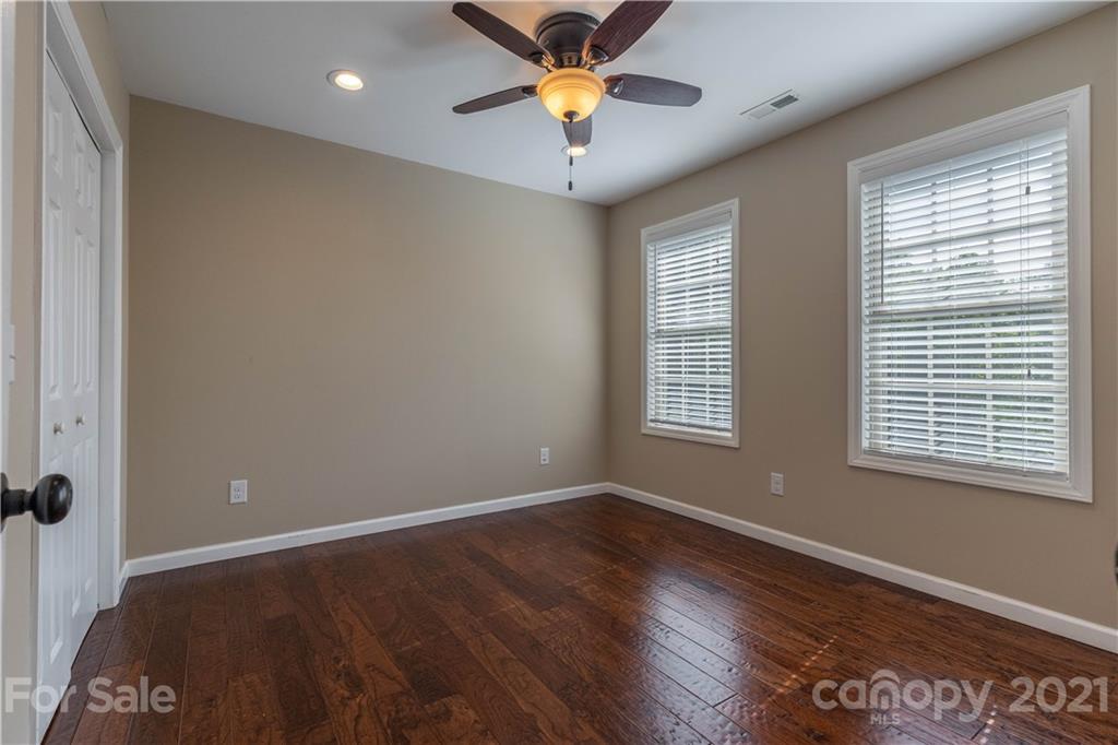 2341 Enola Road Morganton, NC 28655 - Photo 18 of 42 a view of a livingroom with a window and wooden floor