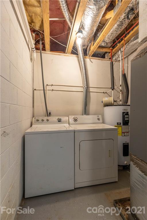2341 Enola Road Morganton, NC 28655 - Photo 21 of 42 a utility room with a sink dryer and washer