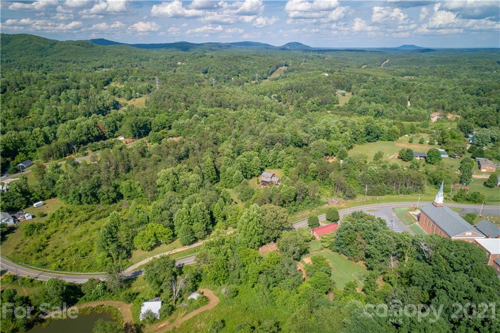 2341 Enola Road Morganton, NC 28655 - Photo 24 of 42 a view of a lush green field