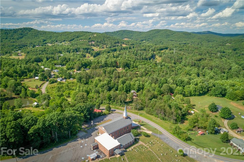 2341 Enola Road Morganton, NC 28655 - Photo 25 of 42 an aerial view of a house with a yard
