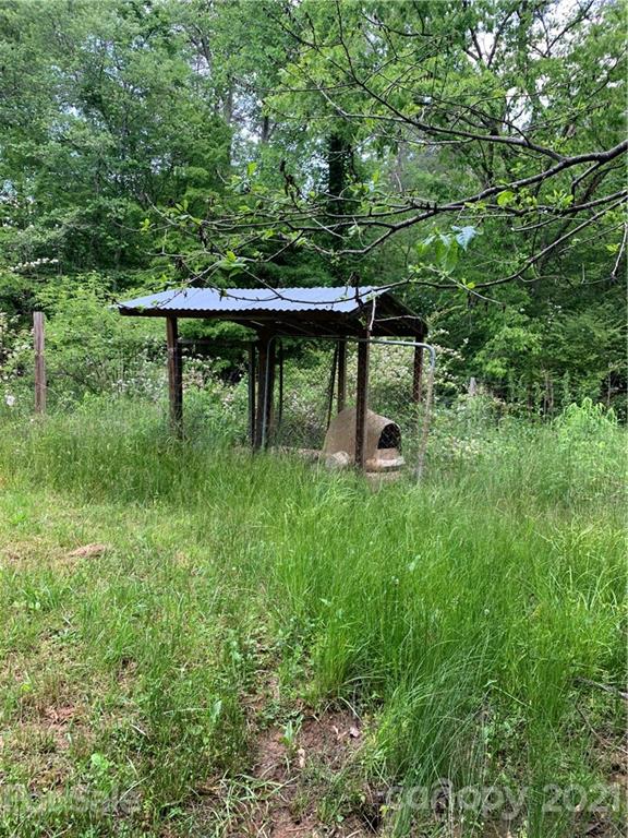 2341 Enola Road Morganton, NC 28655 - Photo 37 of 42 a backyard of a house with lots of green space