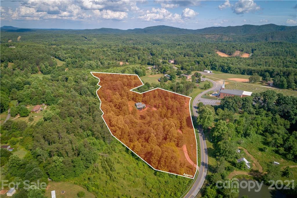 2341 Enola Road Morganton, NC 28655 - Photo 5 of 42 an aerial view of residential houses with outdoor space and trees