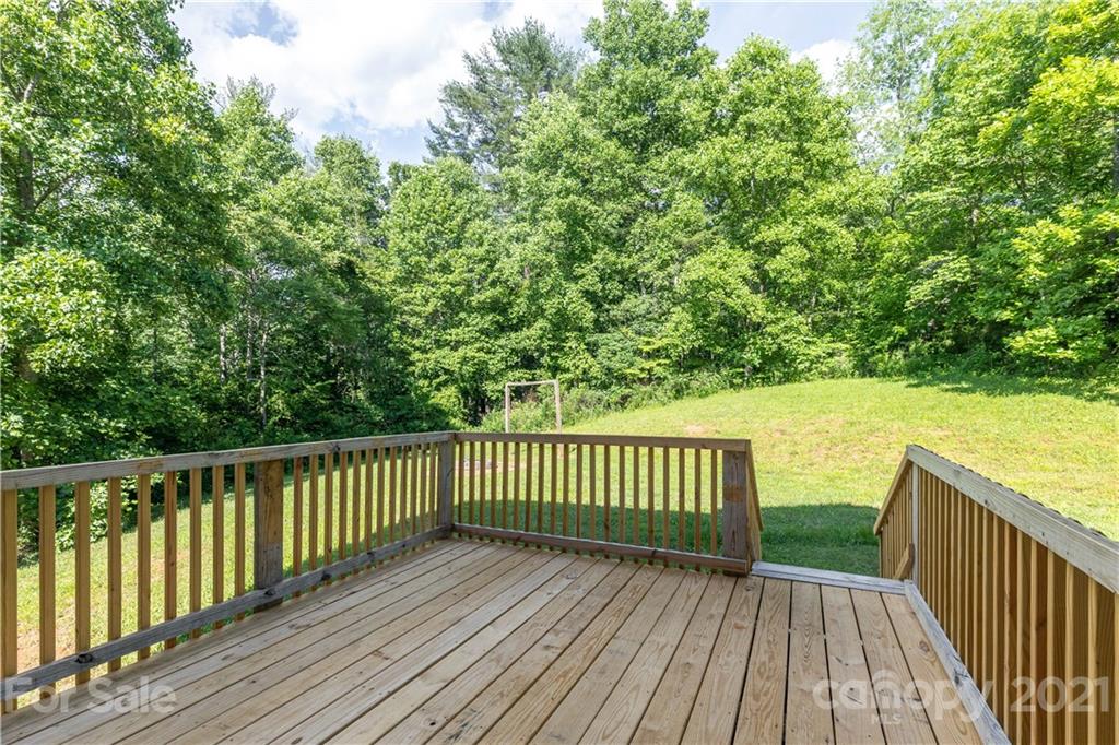 2341 Enola Road Morganton, NC 28655 - Photo 6 of 42 a view of deck with wooden floor and fence