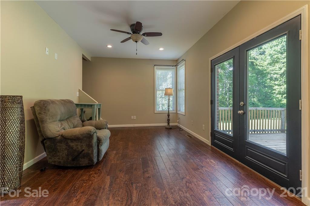 2341 Enola Road Morganton, NC 28655 - Photo 9 of 42 a living room with furniture and a large window