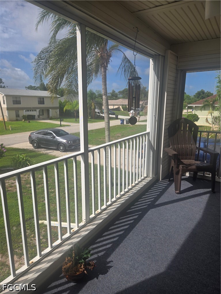 8093 Anhinga Road Fort Myers, FL 33967 - Photo 30 of 49 a view of a balcony with chairs