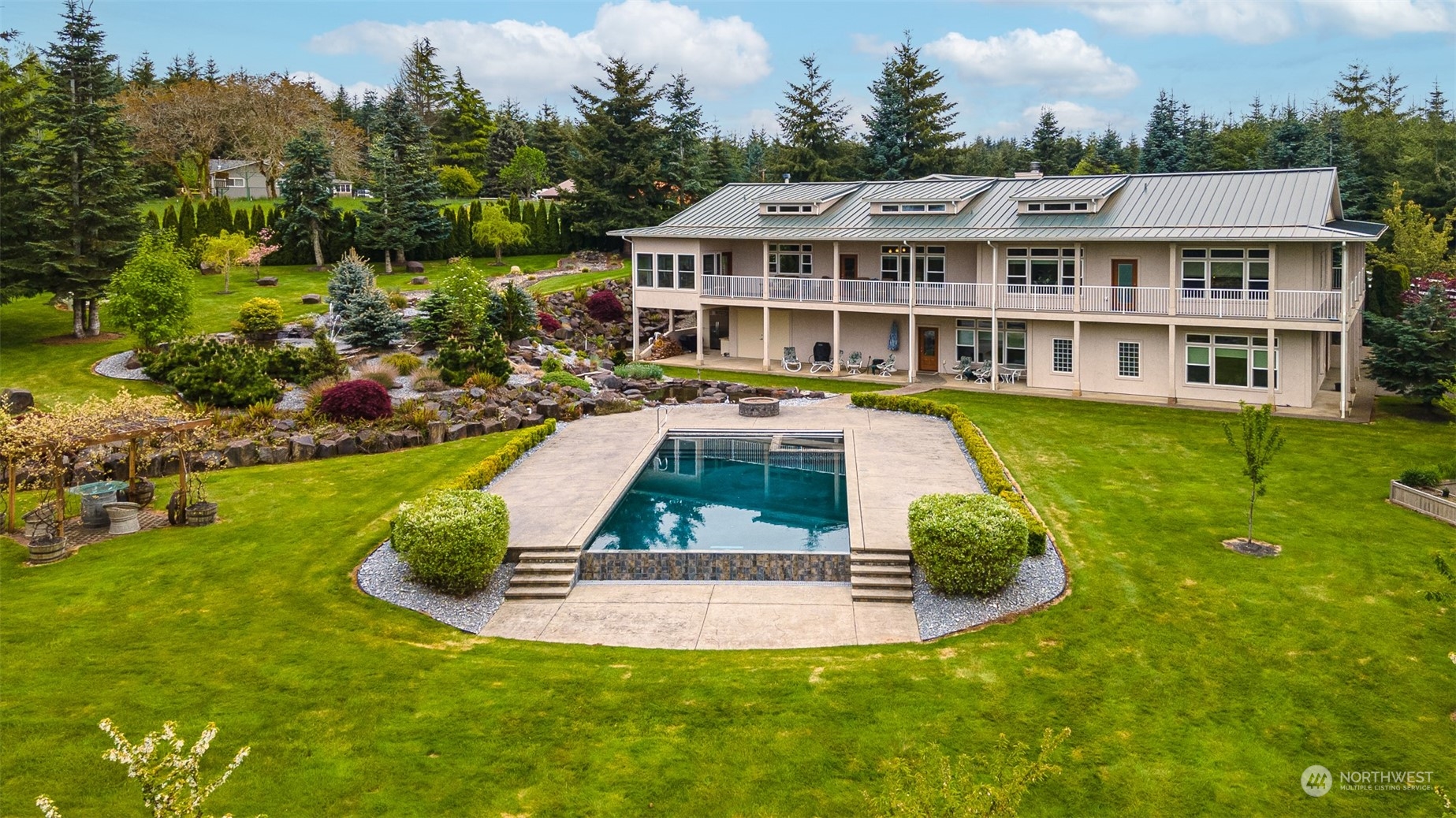 188 Spooner Road Chehalis, WA 98532 - Photo 1 of 40 a view of a house with a swimming pool