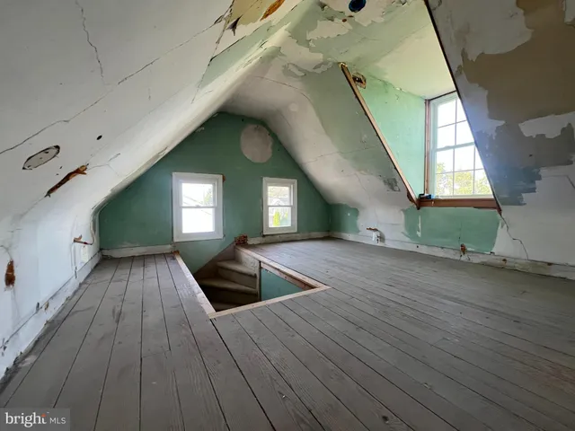 a view of livingroom with hardwood floor and window