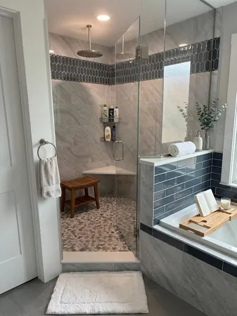 a bathroom with a shower and a sink