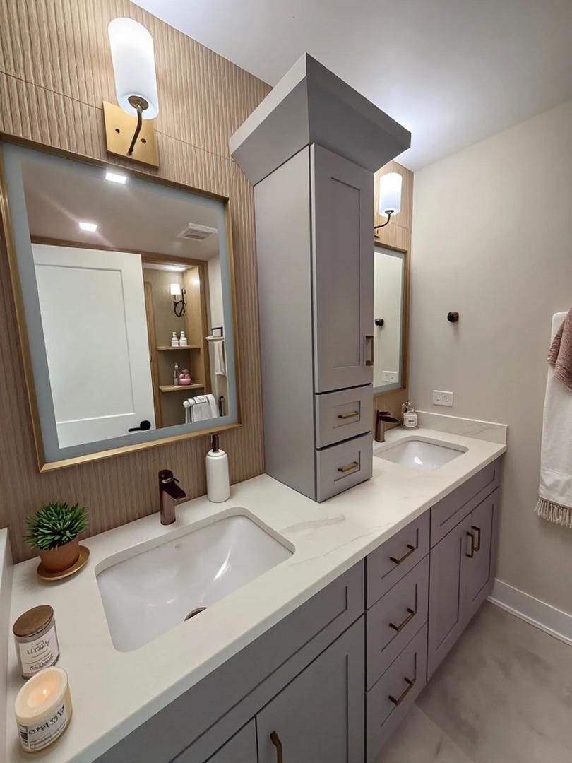 5535 Brookbank Road Downers Grove, IL 60516 - Photo 14 of 22 a bathroom with a sink and a mirror