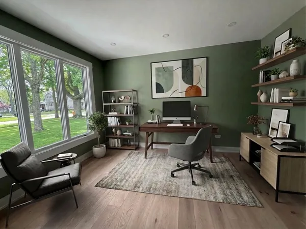 a workspace with furniture hardwood and a window