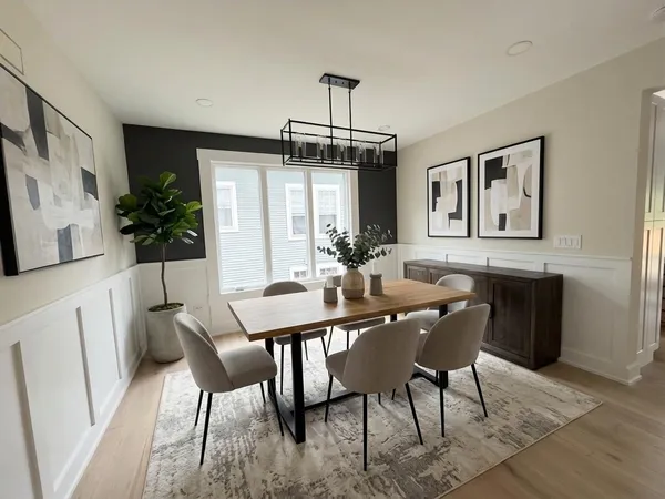 a view of a dining room with furniture
