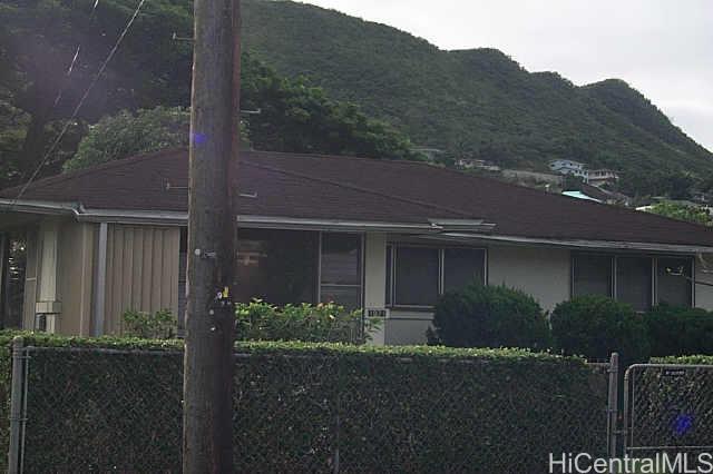 1921 Pacific Heights Road Honolulu, HI 96813 - Photo 1 of 1 a view of a house with a yard