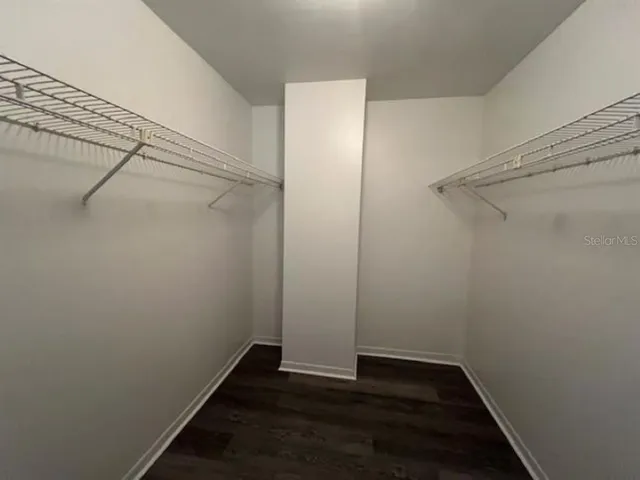 a view of an empty walk in closet