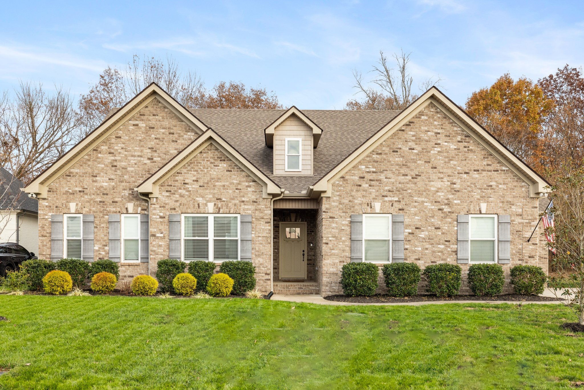 305 McClaran Place Murfreesboro, TN 37129 - Photo 1 of 23 a front view of a house with a yard and garage