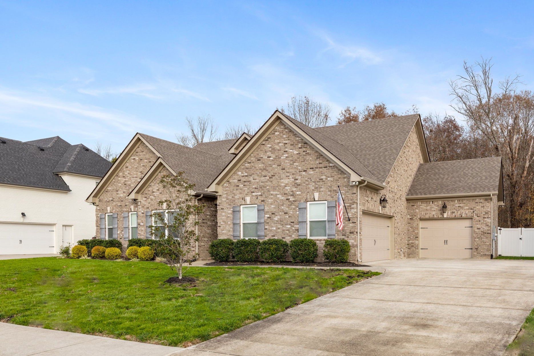 305 McClaran Place Murfreesboro, TN 37129 - Photo 2 of 23 a view of a big house with a big yard and potted plants