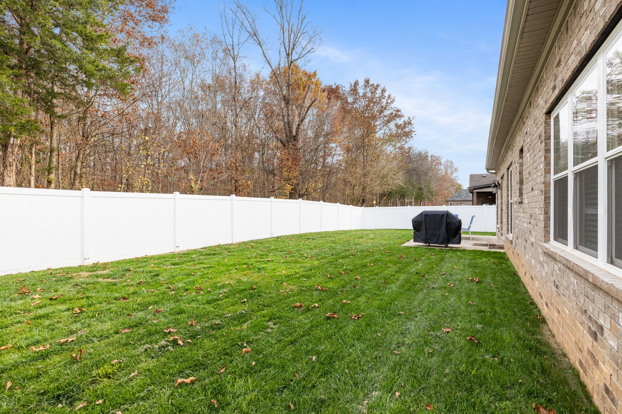 305 McClaran Place Murfreesboro, TN 37129 - Photo 23 of 23 a view of yard with swimming pool and trees in the background