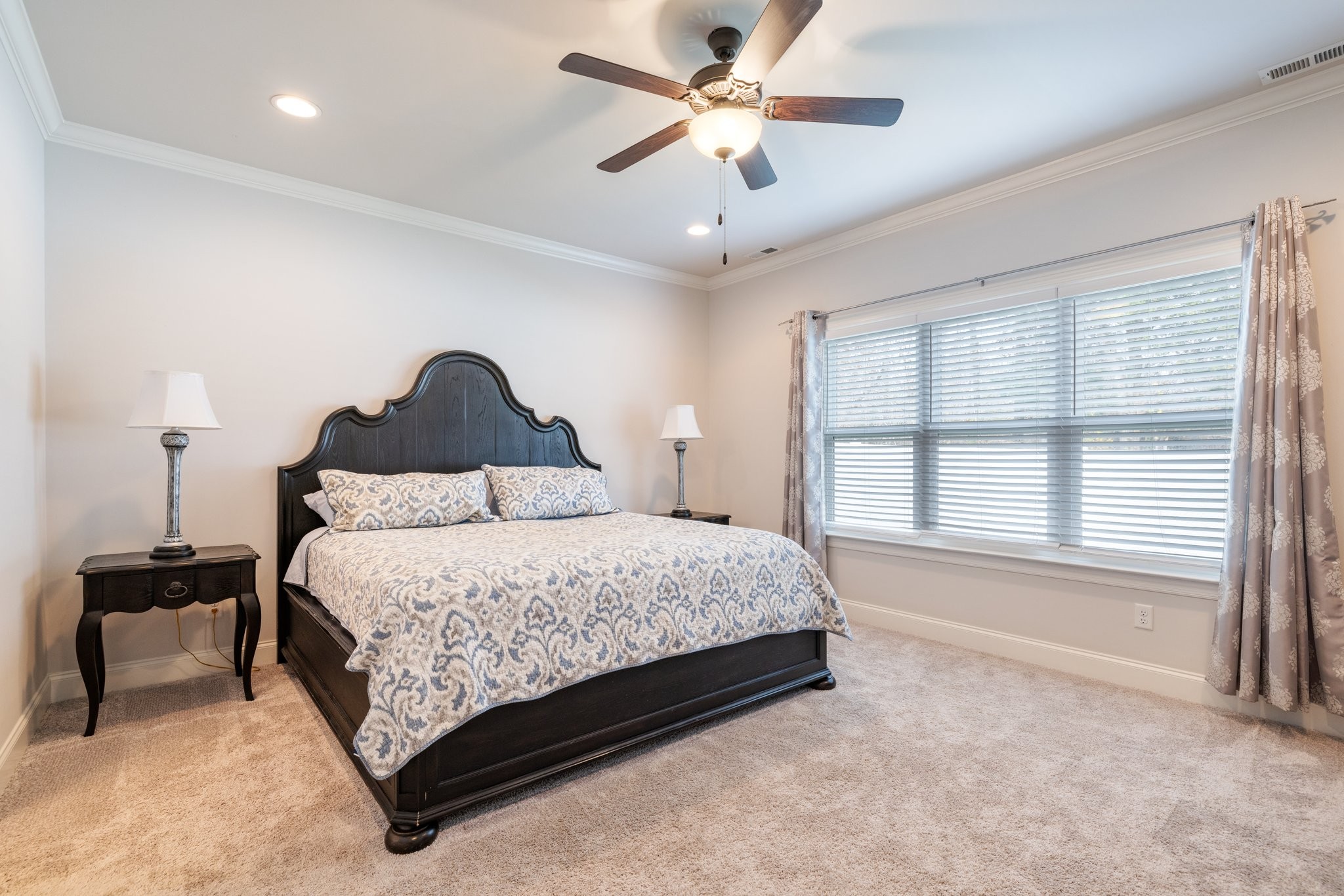 305 McClaran Place Murfreesboro, TN 37129 - Photo 10 of 23 a spacious bedroom with a bed and a chandelier