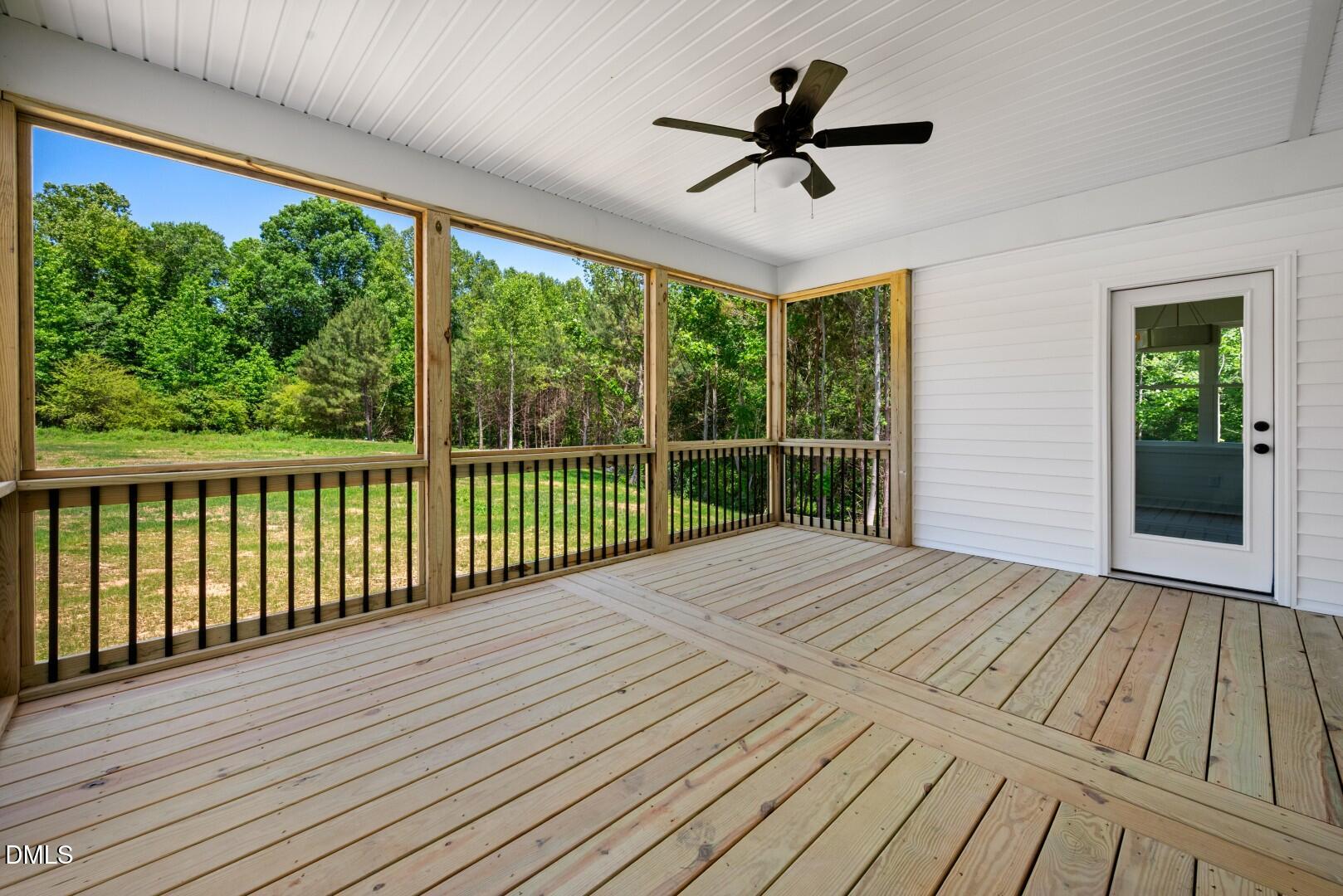 2251 Peachtree Hills Road Spring Hope, NC 27882 - Photo 35 of 46 a view of a deck with wooden floor and wooden floor