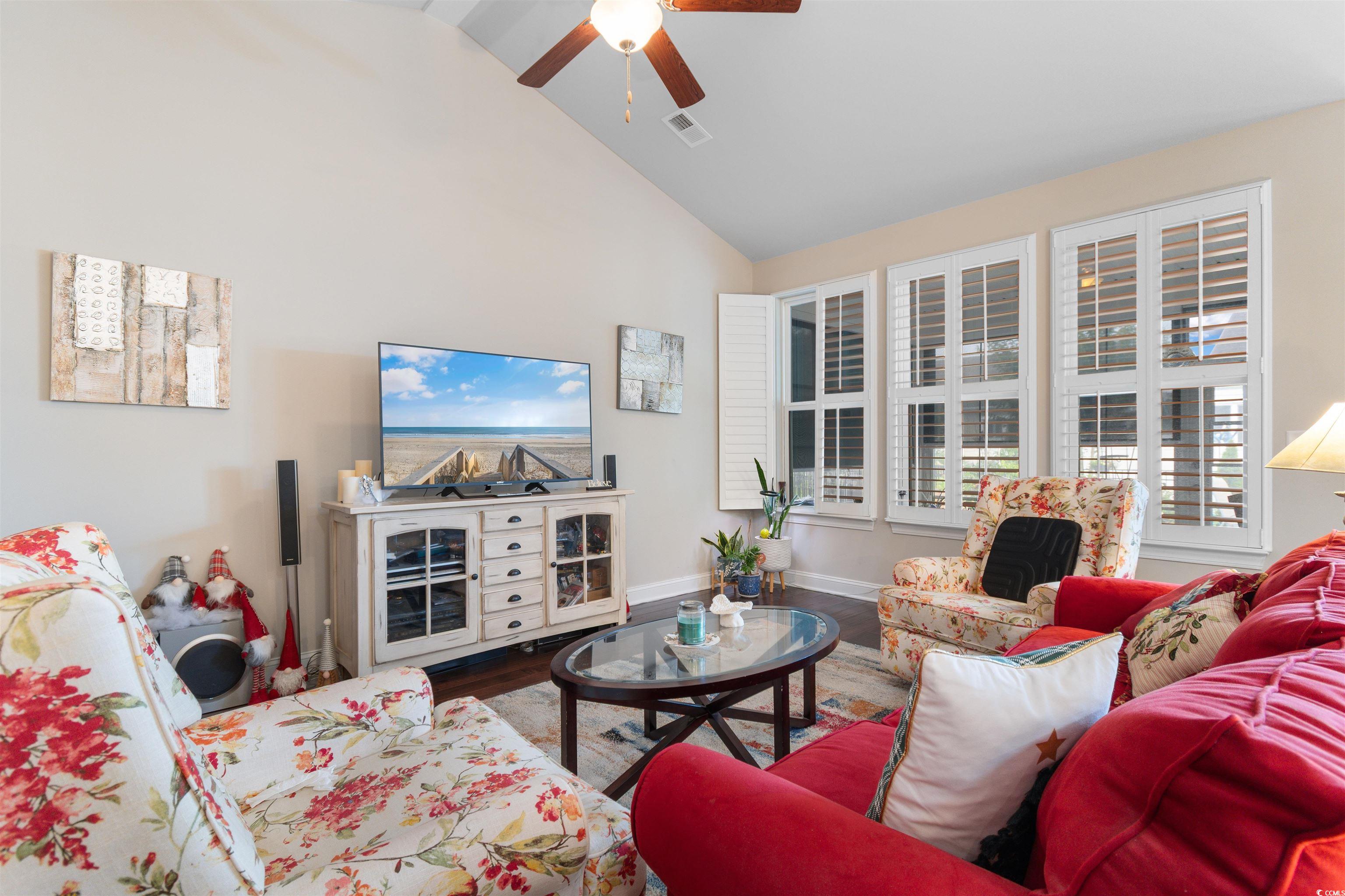 765 Berkshire Avenue Myrtle Beach, SC 29577 - Photo 13 of 40 Living room with ceiling fan, wood finished floors, high vaulted ceiling, and baseboards