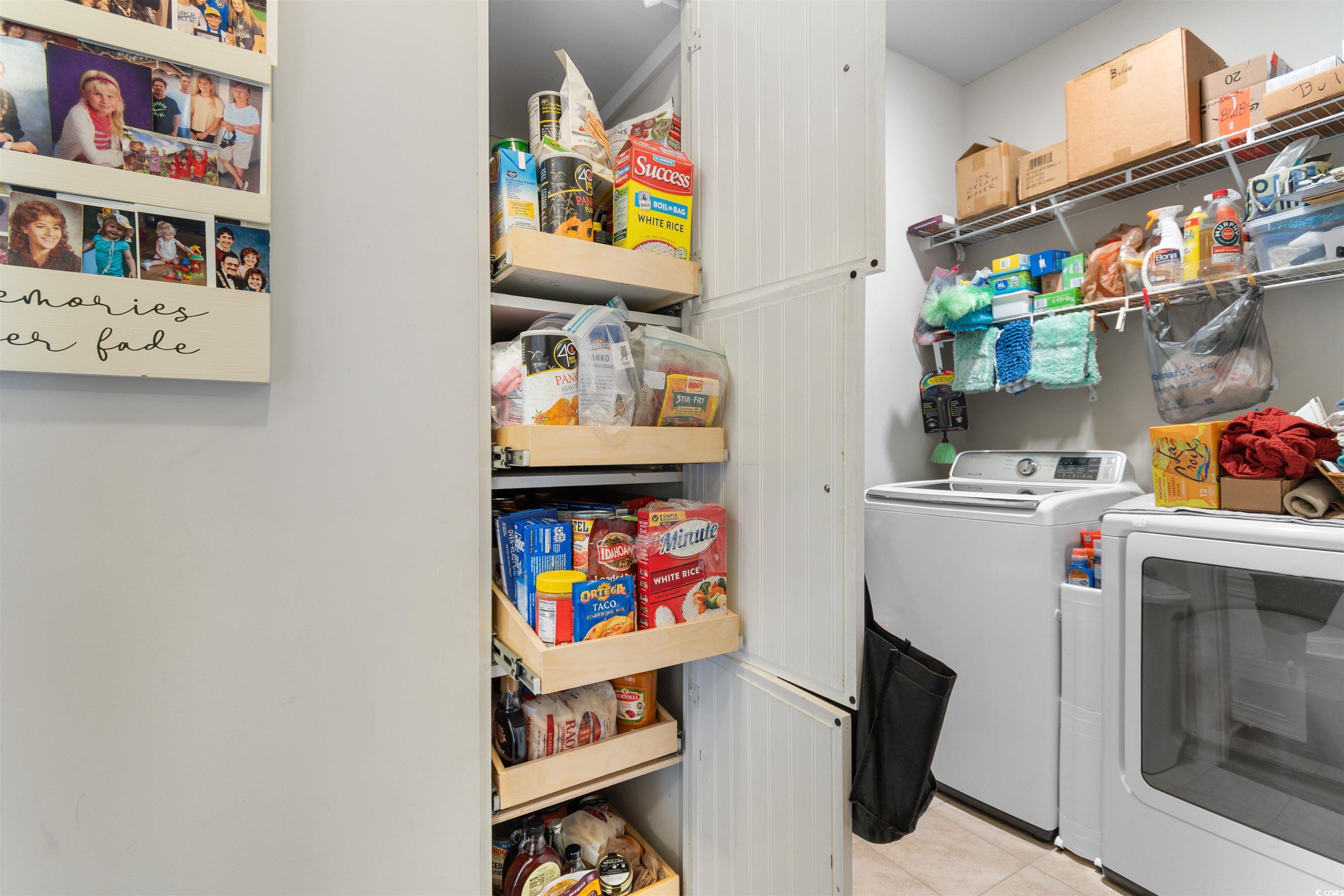 765 Berkshire Avenue Myrtle Beach, SC 29577 - Photo 26 of 40 Laundry area featuring washer and dryer and light tile patterned floors