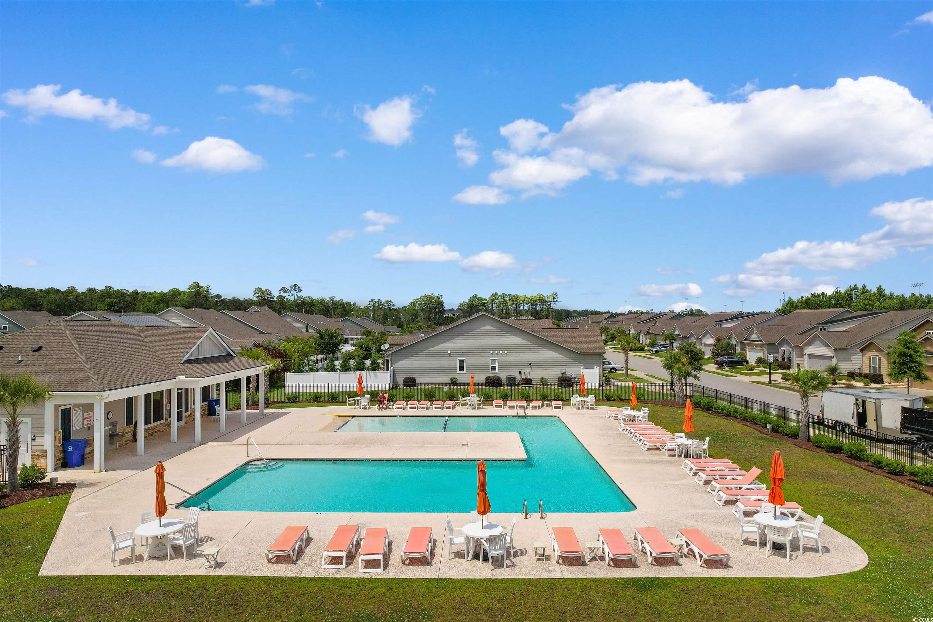 765 Berkshire Avenue Myrtle Beach, SC 29577 - Photo 38 of 40 Community pool with a residential view and a patio