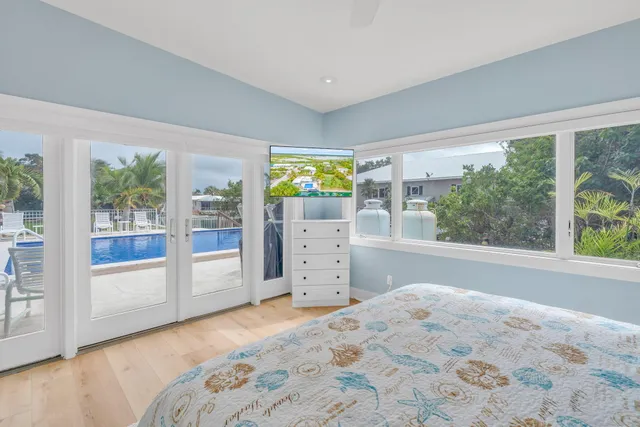 a view of a kitchen cabinets and wooden floor