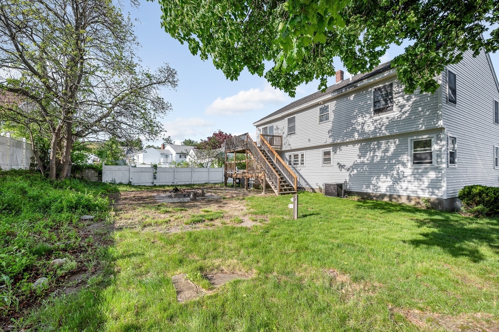 7 Marie Street Methuen, MA 01844 - Photo 36 of 39 a view of a house with a yard