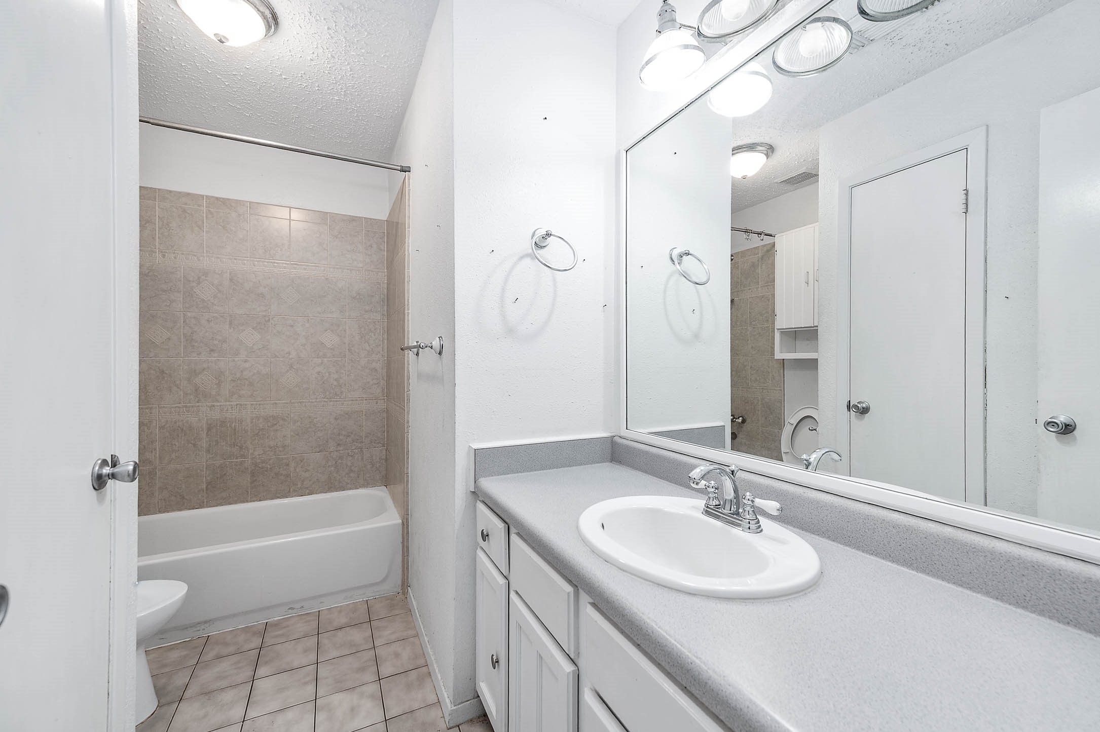 4734 Lost Lake Lane Spring, TX 77388 - Photo 15 of 23 a bathroom with a sink a toilet and shower