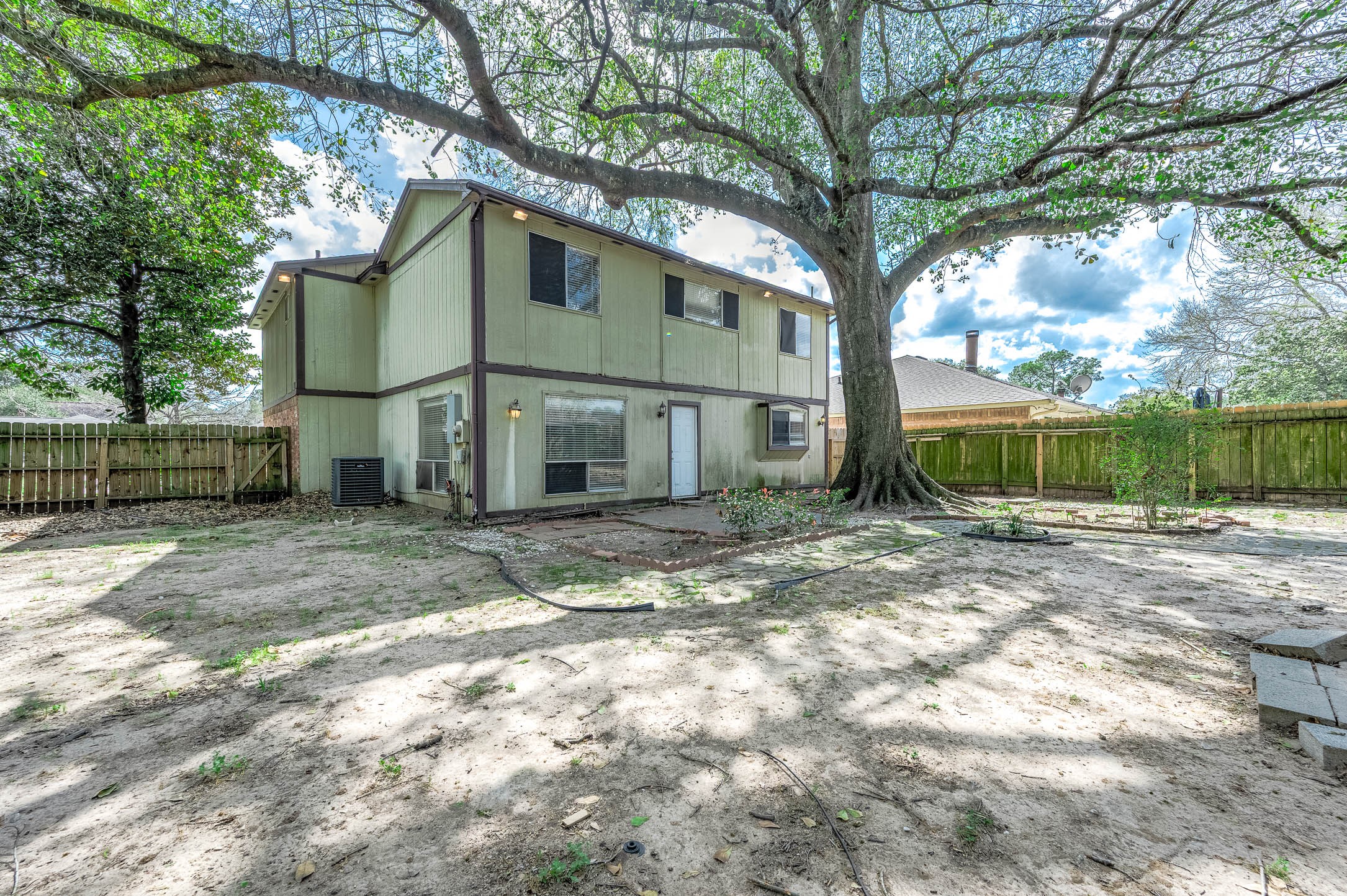 4734 Lost Lake Lane Spring, TX 77388 - Photo 21 of 23 a view of a house with a yard