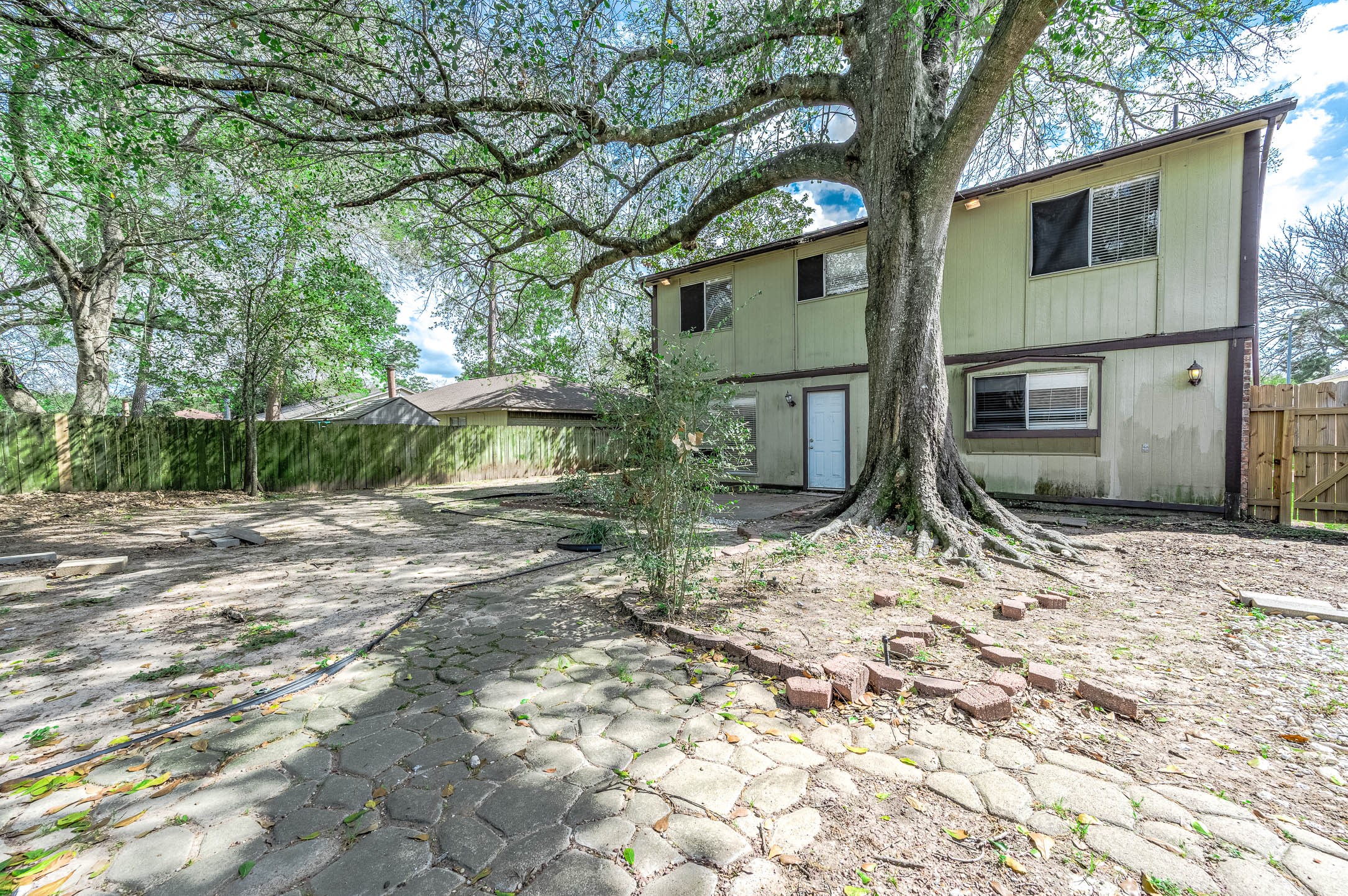 4734 Lost Lake Lane Spring, TX 77388 - Photo 22 of 23 a view of a house with a yard