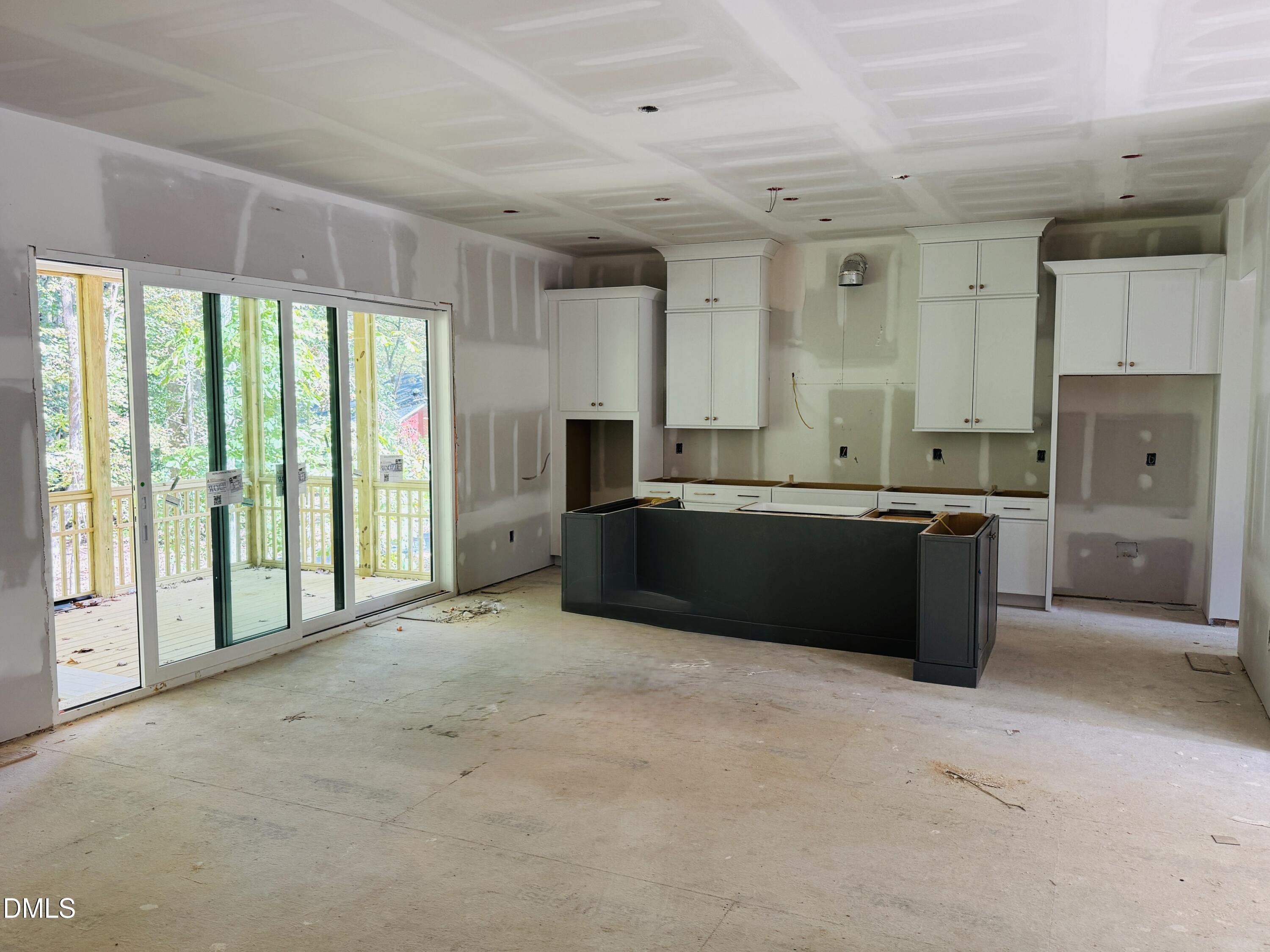 2710 Pathway Drive Chapel Hill, NC 27516 - Photo 4 of 17 a large kitchen with a large window and stainless steel appliances