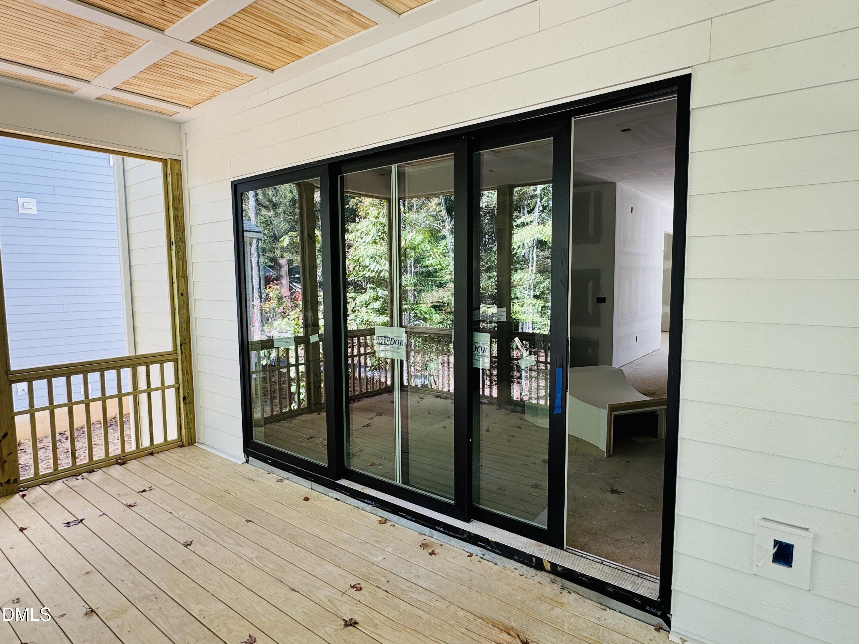 2710 Pathway Drive Chapel Hill, NC 27516 - Photo 7 of 17 a view of a balcony with wooden floor